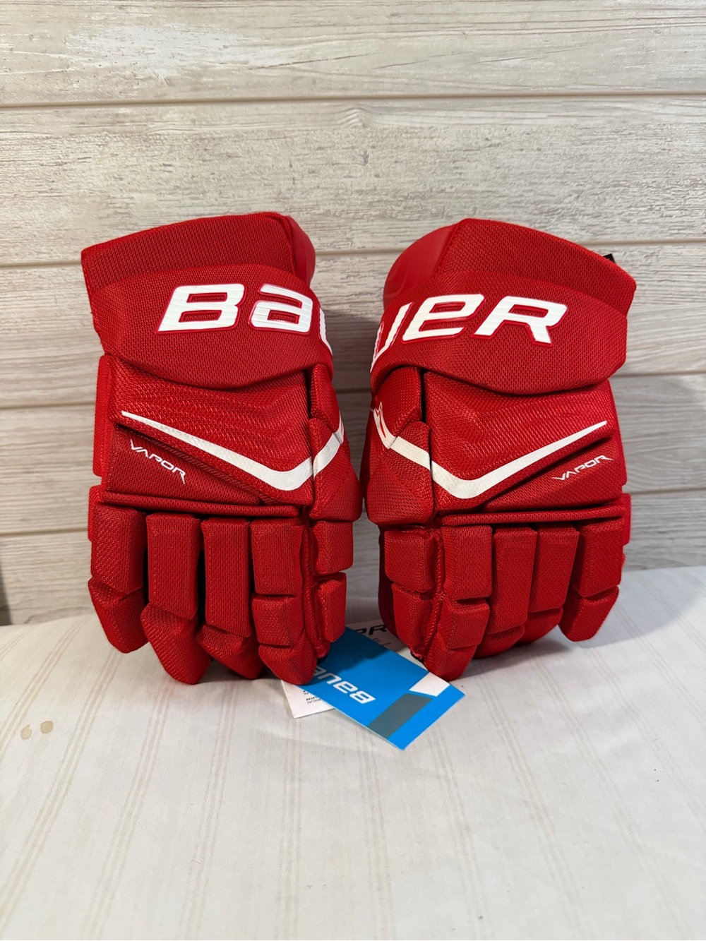 Bauer size 13 red gloves with tags